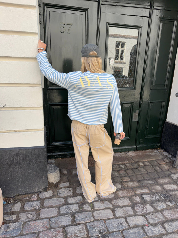 Lumi striped long-sleeved polo - Light blue/white